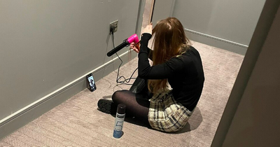 Luxury Edinburgh hotel sorry as guest left sat on corridor floor to get ready