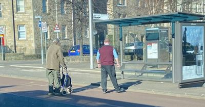 Moment hero Edinburgh bus driver stops to help struggling man across the road