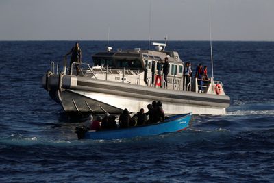 Fourteen people drown when Italy-bound boat sinks off Tunisia