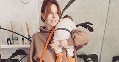 Stacey Dooley gets birthday cuddle from baby Minnie in rare snap posted by dad Kevin
