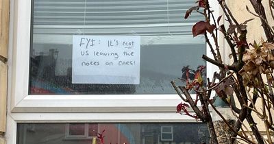'It's not us!' - new twist in street parking row as neighbours post their own signs