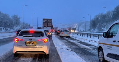 'Scary' scenes on M62 as drivers freed by mountain rescue and cars left 'completely stuck' in heavy snow