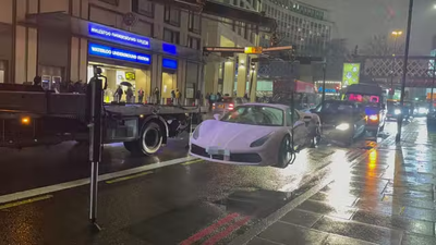 Pink Ferrari worth £175,000 towed after ‘parking in bus lane’