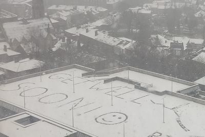 Hospital visitors spot giant ‘get well soon’ message in snow on car park roof