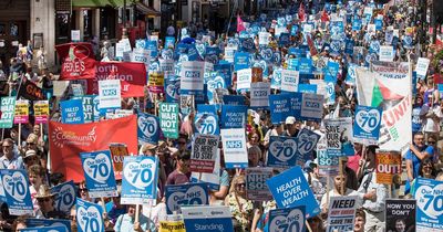 Desperate patients and medics march together to back NHS in crisis caused by Tories