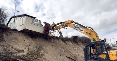 Terrified residents evacuated from cliff-edge homes over fears they could plunge into sea