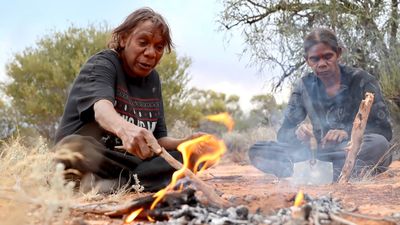 Nuclear tests, missionaries displaced the Spinifex people. Now they're back and relearning from the elders