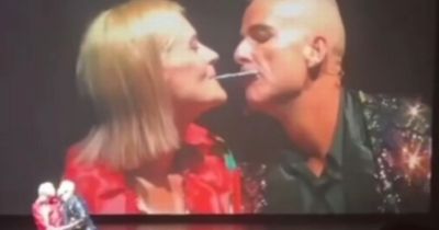Moment magician is tackled on stage on cruise ship while attempting intimate trick