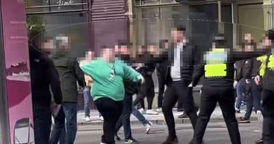 Football fans clash outside Edinburgh train station following cup match