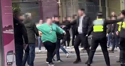 Feuding football fans brawl outside Scots train station after cup match