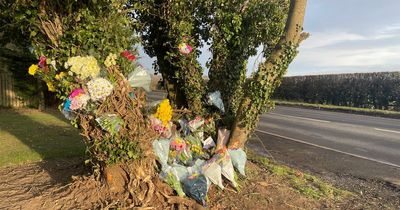 Dozens of floral tributes left at the scene in Northumberland where 16 and 17 year old lost their lives in early hours crash