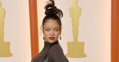 Rihanna shows off blossoming baby bump at Oscars after Super Bowl pregnancy reveal