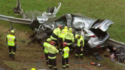 Three-month-old baby fighting for life in 'tragic' car crash that killed mother, another child in south-west of Sydney