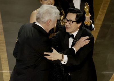 Harrison Ford and Ke Huy Quan share wholesome Indiana Jones reunion on stage at the Oscars