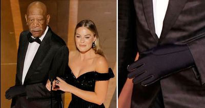 Why Morgan Freeman wore glove on left hand at Oscars with Margot Robbie after accident