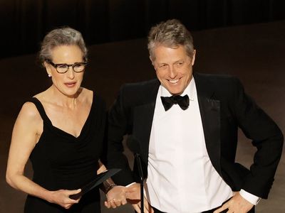 Hugh Grant calls himself ‘a scrotum’ compared to ‘stunning’ Andie MacDowell during Oscars