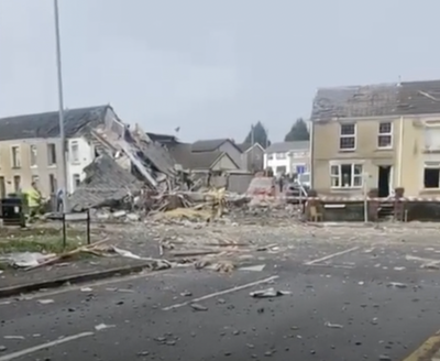 One missing and three in hospital after explosion at Swansea home