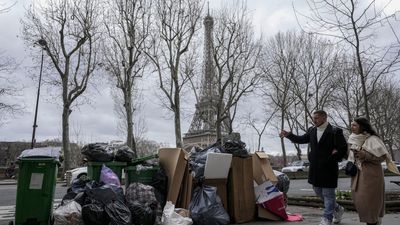 Mountains of rubbish in Paris as garbage collectors strike over pension reform
