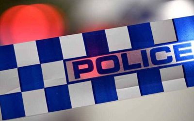 Police hunt armed person in Queensland town