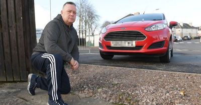 Furious Lanarkshire dad unable to park in driveway due to 1ft high kerb