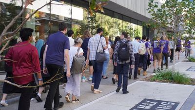 Hundreds of Curtin University staff walk off the job in fight over pay and conditions