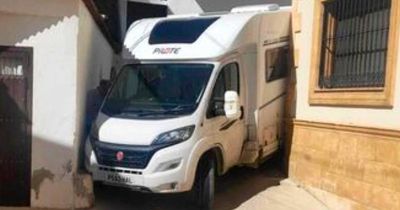 British couple mortified as they get campervan stuck in narrow street abroad