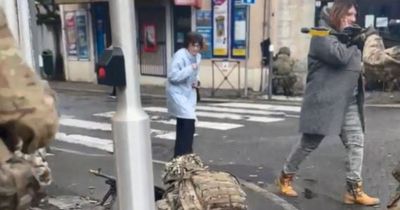 Surreal sight as British soldiers swarm French city of Cahors while locals go about their day