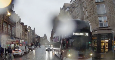 Heart-stopping moment Edinburgh cyclist has near miss with a bus on busy street