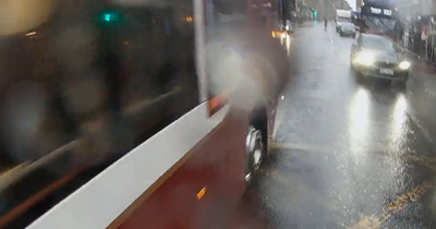 Scots cyclist nearly falls into traffic after terrifying near miss as double decker bus drives narrowly past