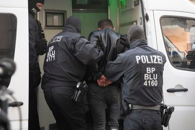 German police conduct raids on suspected people smugglers