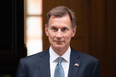 Watch: Jeremy Hunt presents red box on Downing Street ahead of Budget