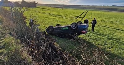 Woman charged after car flips on roof following crash on busy Fife road