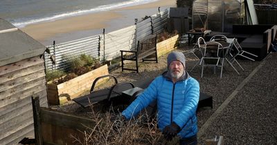 Man who refused to abandon clifftop home forced to flee as it threatens to crumble away