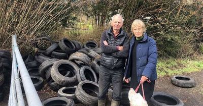 Elderly couple come home to find flytippers have dumped over 80 tyres on their driveway