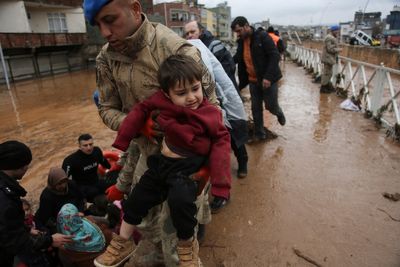 Floods hit earthquake disaster zone in Turkey, killing at least a dozen