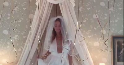 Millie Mackintosh stuns in plunging white dress and veil at cheeky hen do with famous girlfriends
