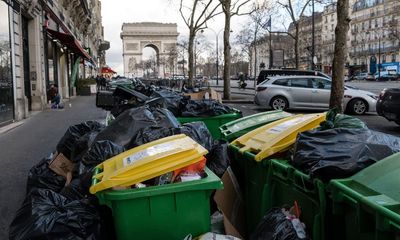 ‘It’s disgusting’: Paris rots under mounds of rubbish as bin collectors extend strike