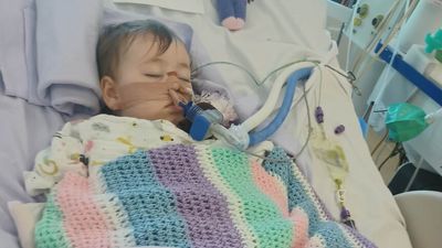 Father slams Mackay Base Hospital for dismissing baby with button battery in throat