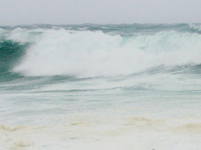 SOS on beach sparks rescue after pair nearly drown