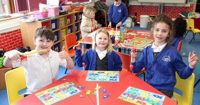 Dunscore Primary pupil spread Fairtrade message with Wee Brew