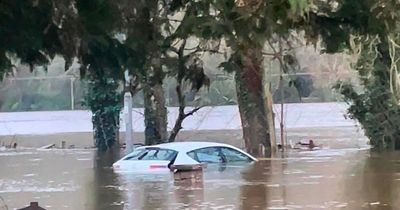 Airbnb holidaymakers park car by river - and come back to it SUBMERGED in water