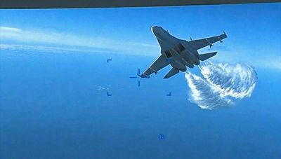 Ukraine war – latest news: US shares footage of Russian aircraft ‘dumping fuel’ on drone