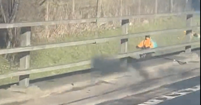 Glasgow Deliveroo cyclist spotted going opposite way down on ramp of busy M8 motorway