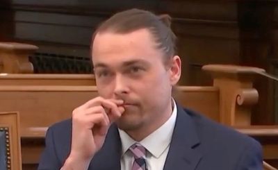 Moment father appears to send signal warning daughter to stop talking as she testifies at his murder trial