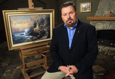 Thomas Kinkade’s serene paintings hung in one of 20 American homes — as he hid a vault of tortured art