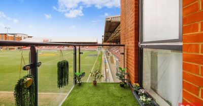 Flat inside football stadium you can buy for £350,000 with balcony that overlooks pitch
