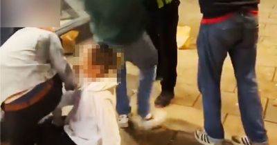 Moment McDonald's security guard body slams woman 'after row over eating chips'