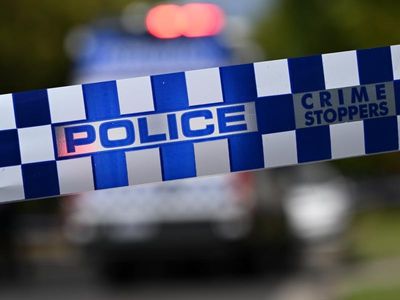 Woman dies after being found by neighbours in driveway