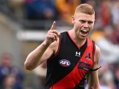 Essendon spearhead Wright re-signs until 2027