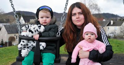 Dalbeattie family left "scared and frightened" after police raid flat in their building